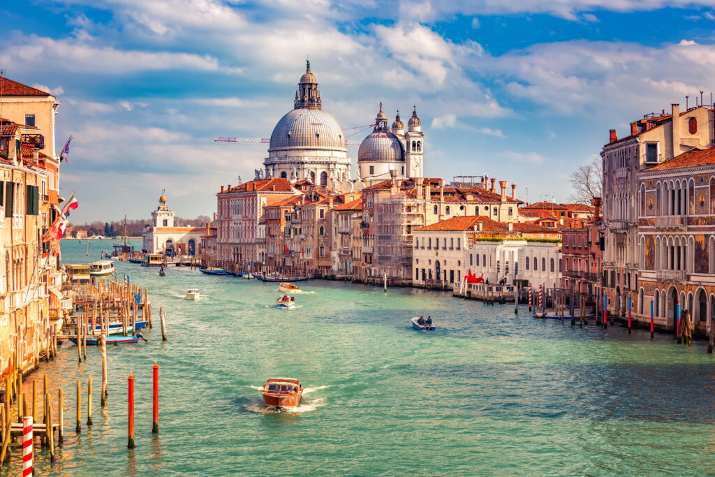 Grand Canal and Basilica Santa Maria della Salute in Venice (Photo Credit: iStock)