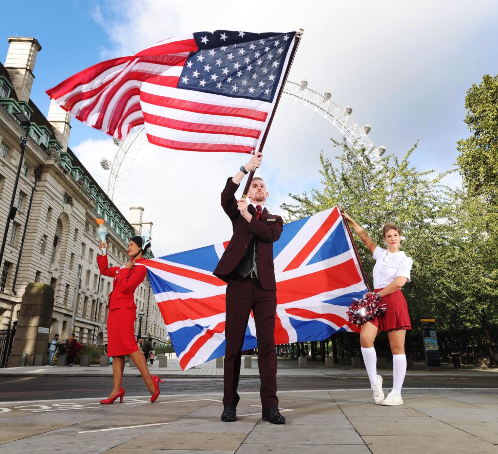 Virgin Atlantic cabin crew pose at the London Eye to bring to life new research on what Brits are most looking forward to about returning to the United States, ahead of the border opening on 8 November. (Photo Credit: Virgin Atlantic)