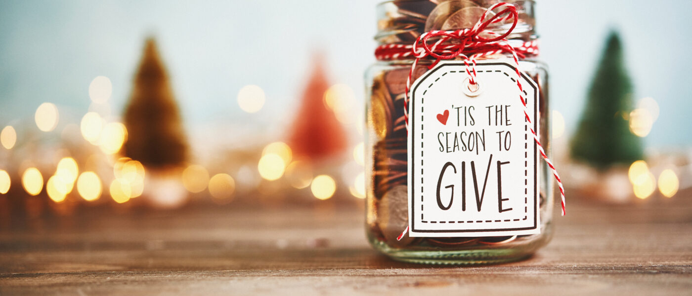 It's the season to give. Donation jar with money