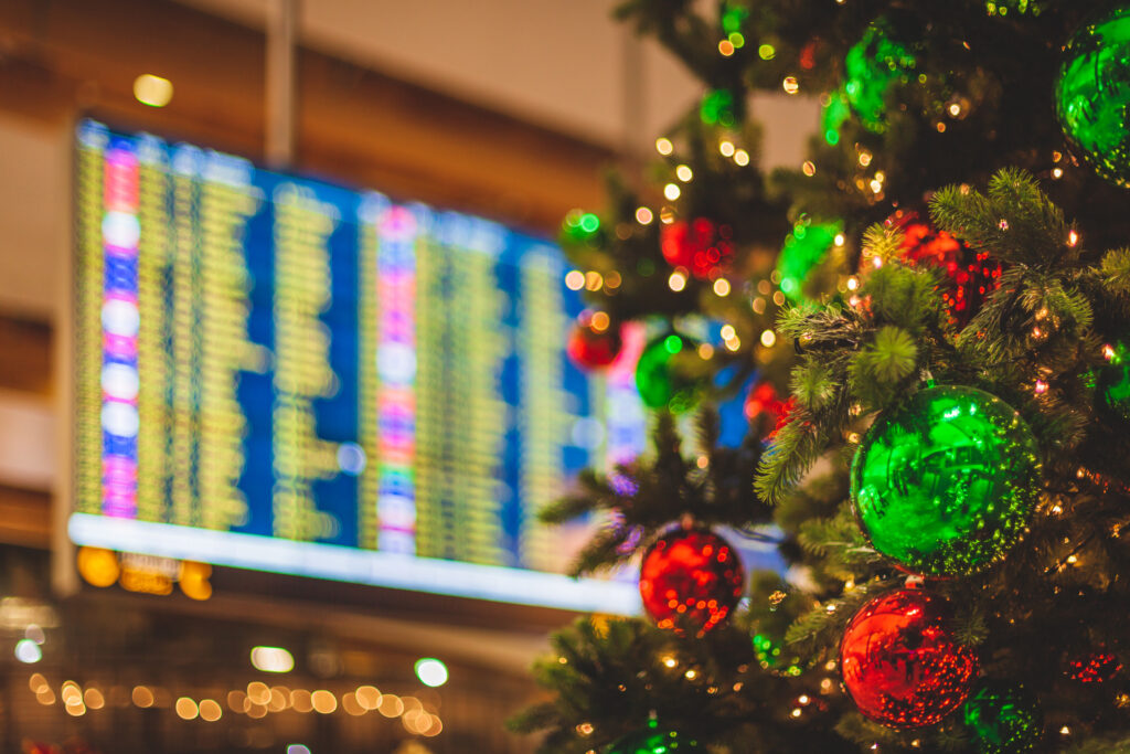 Airport with a Christmas tree in the forefront (Photo Credit: iStock)