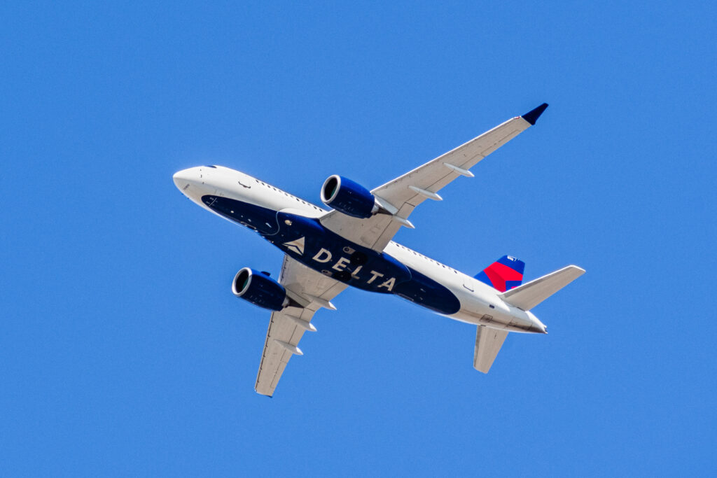 Mother frustrated when no an "X" option isn't listed as an option for nonbinary travelers on Delta Airlines Online Reservations System. (Photo Credit: Sundry Photography / iStock)