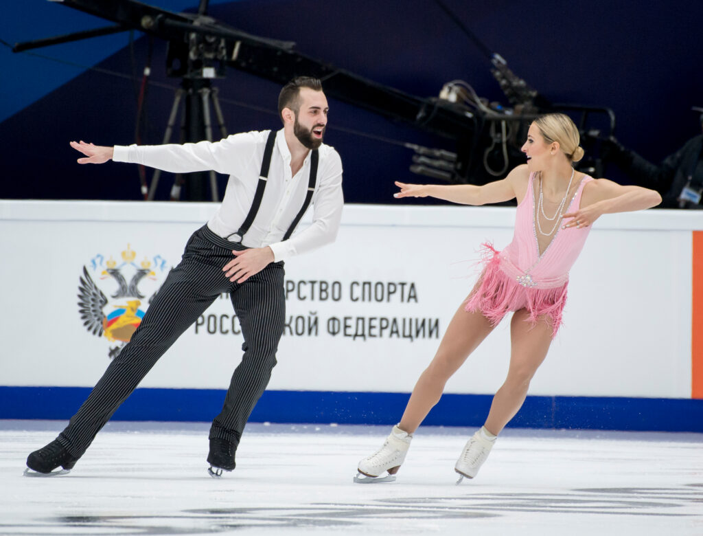 Nonbinary Figure Skater Timothy LeDuc and his skating partner Ashley Cain-Gribble (Photo Credit: EUPA-IMAGES / Shutterstock)