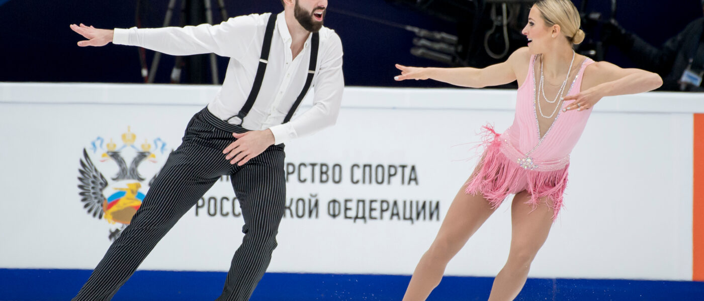 Nonbinary Figure Skater Timothy LeDuc and his skating partner Ashley Cain-Gribble (Photo Credit: EUPA-IMAGES / Shutterstock)