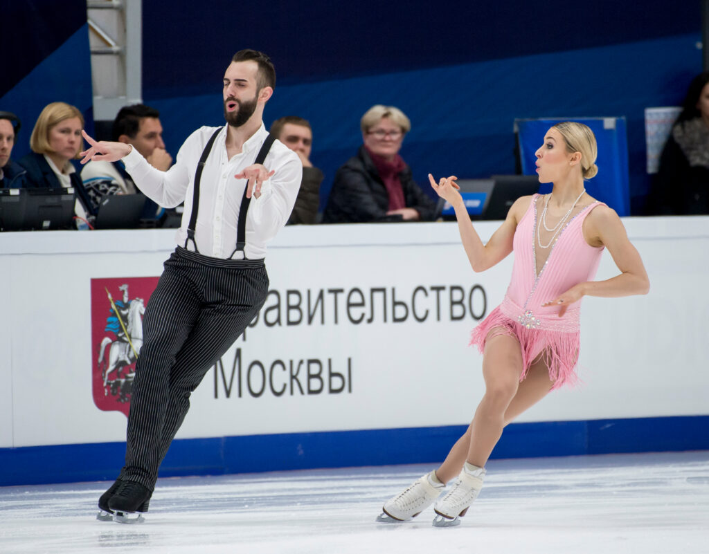 Nonbinary Figure Skater Timothy LeDuc and his skating partner Ashley Cain-Gribble (Photo Credit: EUPA-IMAGES / Shutterstock)