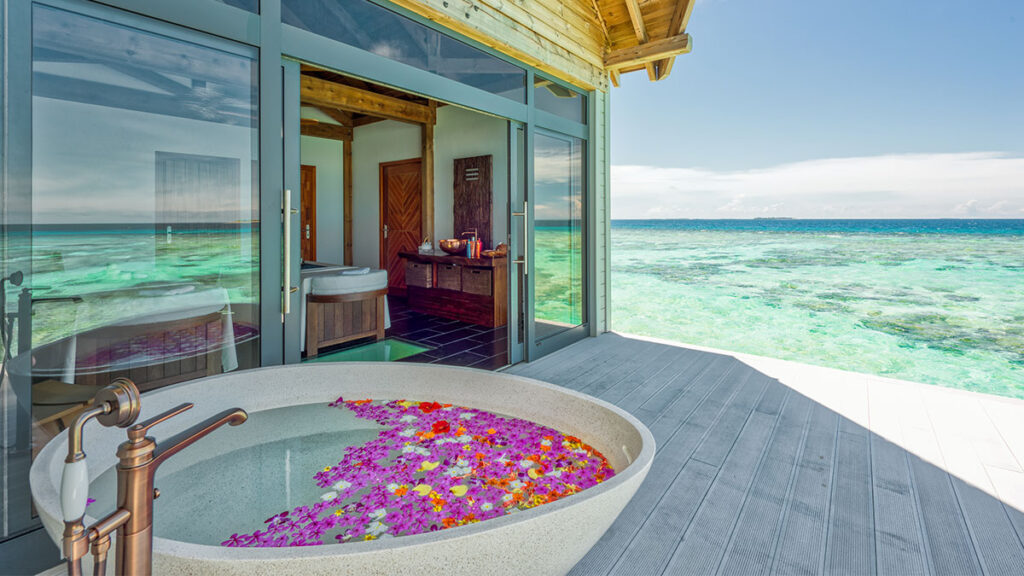 The exterior of an overwater treatment room at The Sun Spa by Healing Earth (Photo Credit: Mövenpick Resort Kuredhivaru Maldives)