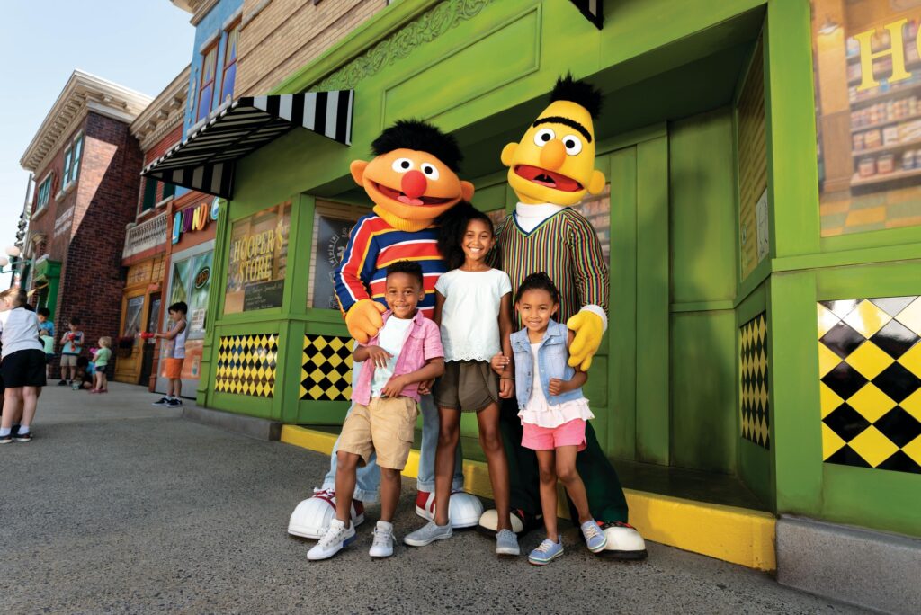 LGBTQ+ families will feel welcomed at theme parks like Sesame Place with Bert and Ernie (Photo Credit: Sesame Place)